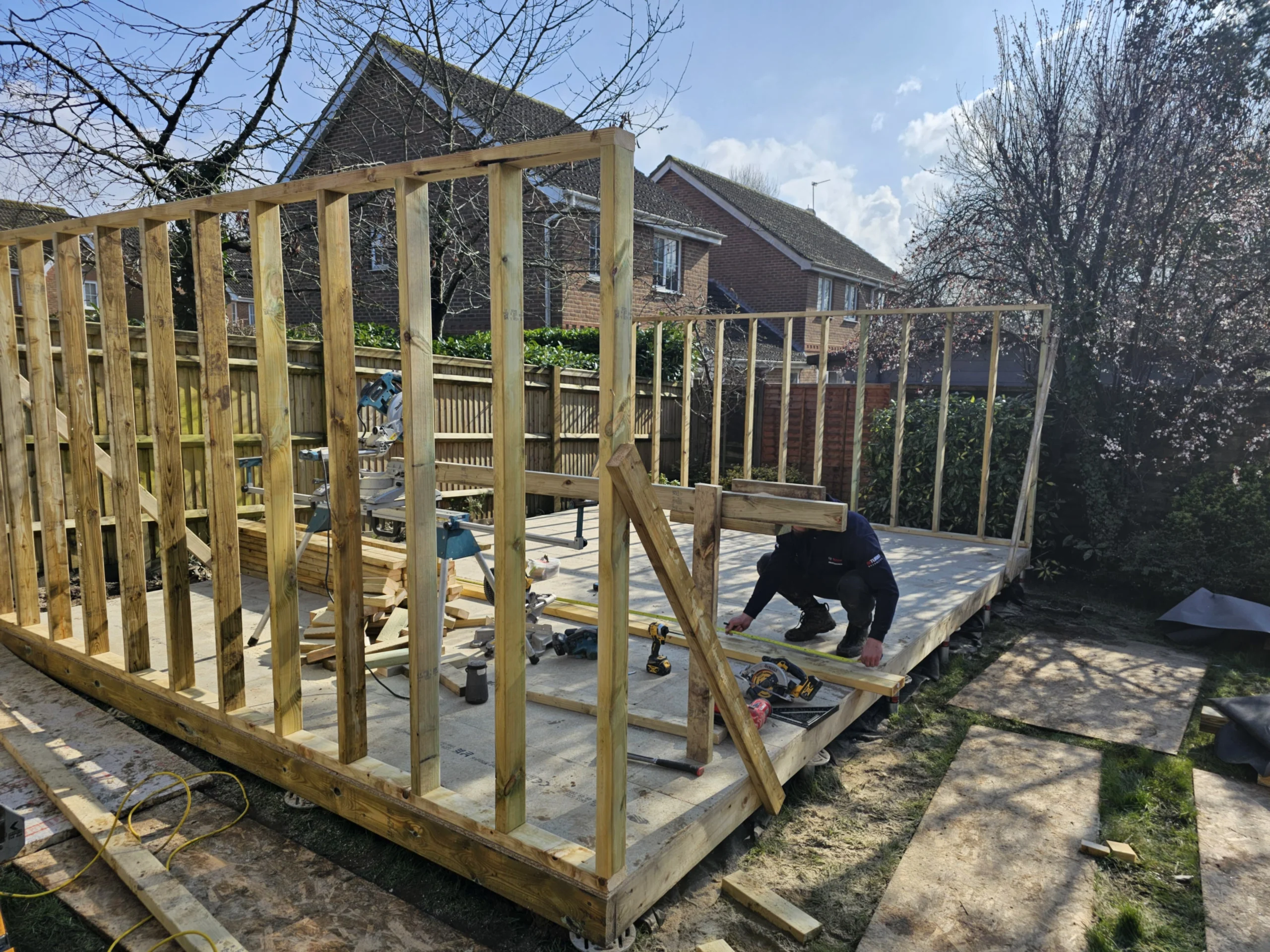 Rytis constructing a timber frame